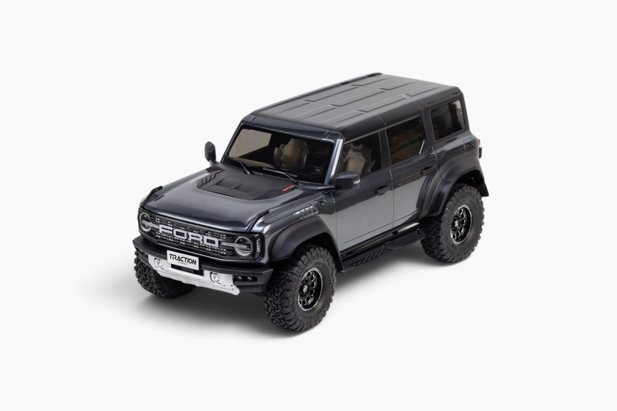 Traction Hobby 1/8 Ford Bronco Raptor in Grey, front three-quarter studio view