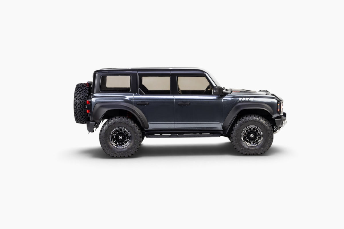 Traction Hobby 1/8 Ford Bronco Raptor in Grey, side-profile studio view